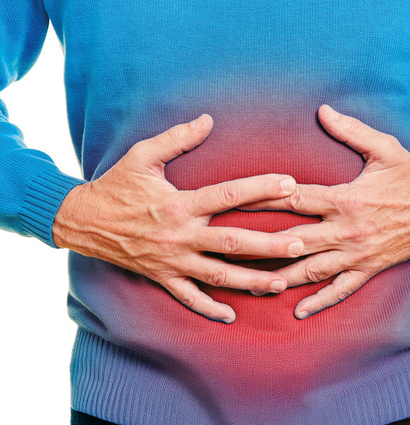 Mann der sich einen schmerzenden Bauch hält